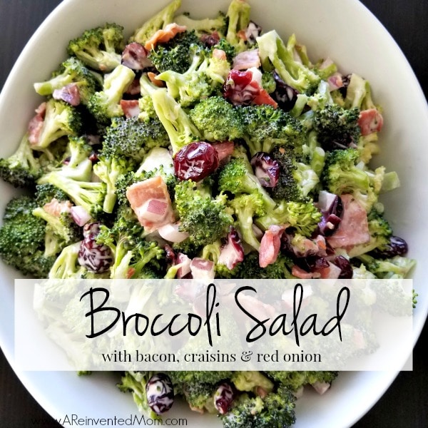 White bowl filled with Broccoli Salad, bacon, cranberries with graphic overlay.