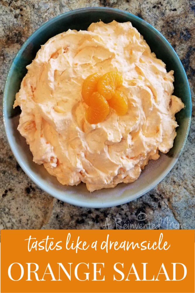 Top view of a bowl of Mandarin Orange Jello Salad | A Reinvented Mom #orangejellosalad