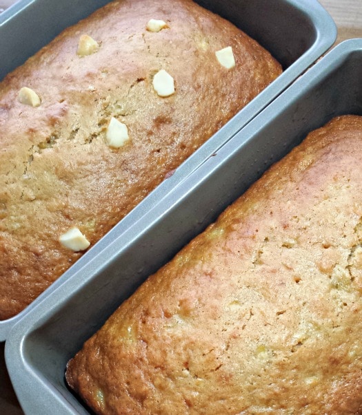 Cropped photo of 2 loaves of Hawaiian Mac Nut Banana Bread | A Reinvented Mom