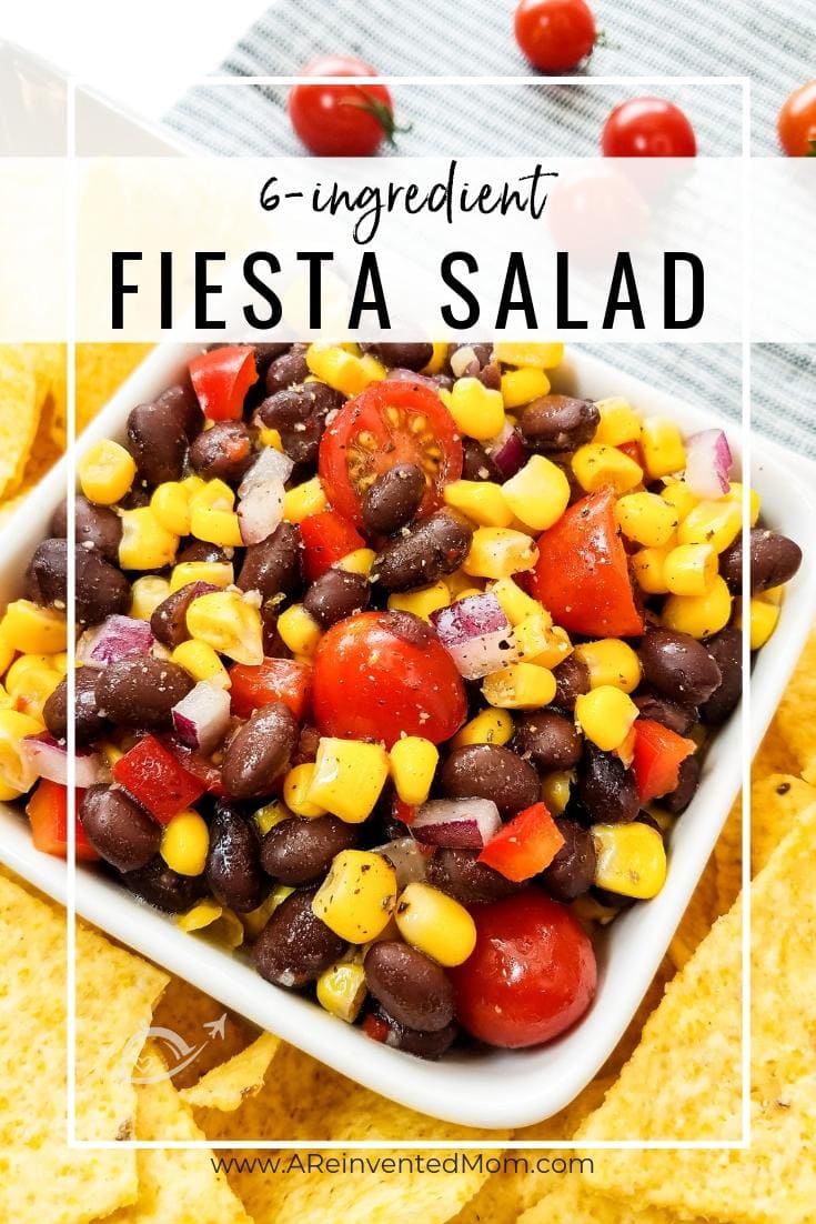 Bowl of corn, black beans, tomatoes & peppers with tortilla chips | 6-Ingredient Fiesta Salad by A Reinvented Momin a bowl