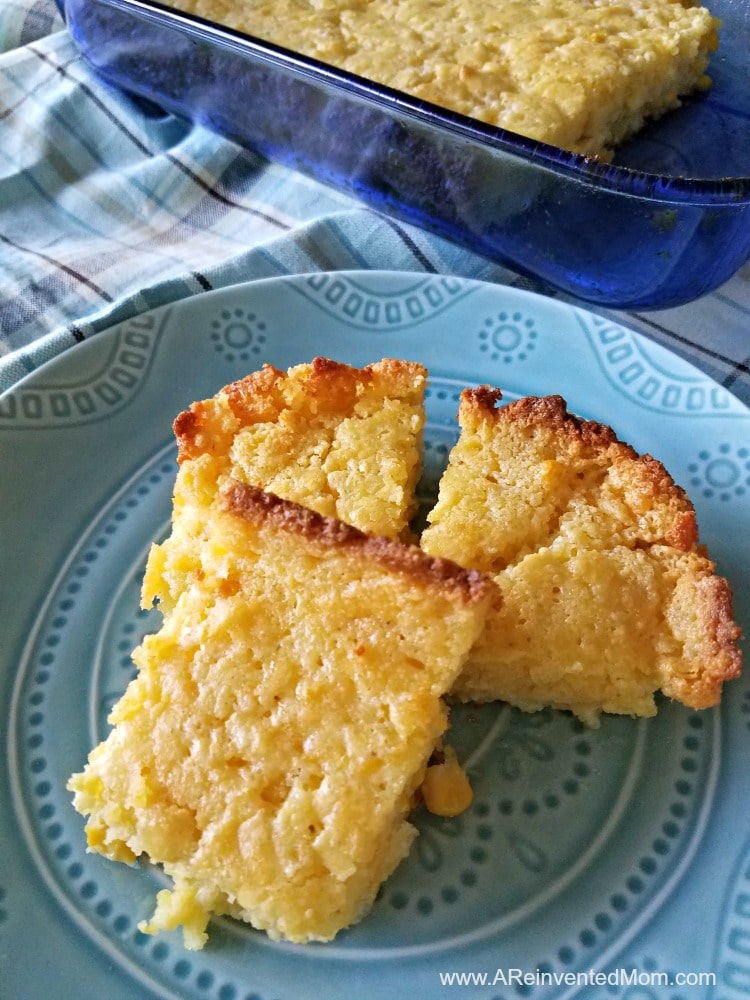 Decorative blue plate with 3 slices of Katie's Cornbread Casserole | A Reinvented Mom