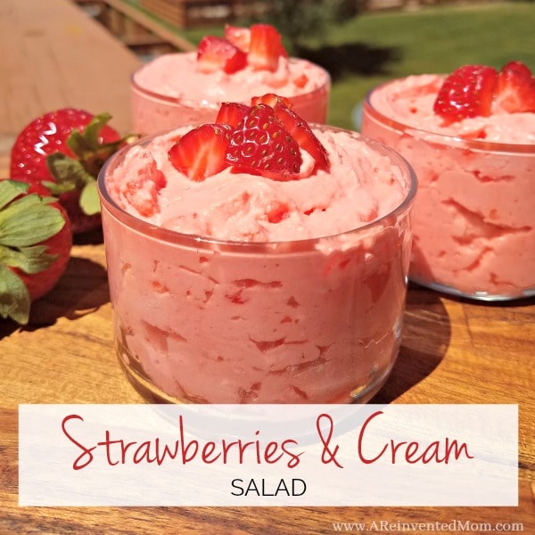 Sweet strawberries paired with a creamy vanilla base for an easy make-ahead dish. Strawberries & Cream Salad. www.AReinventedMom.com #strawberries #strawberryjellosalad