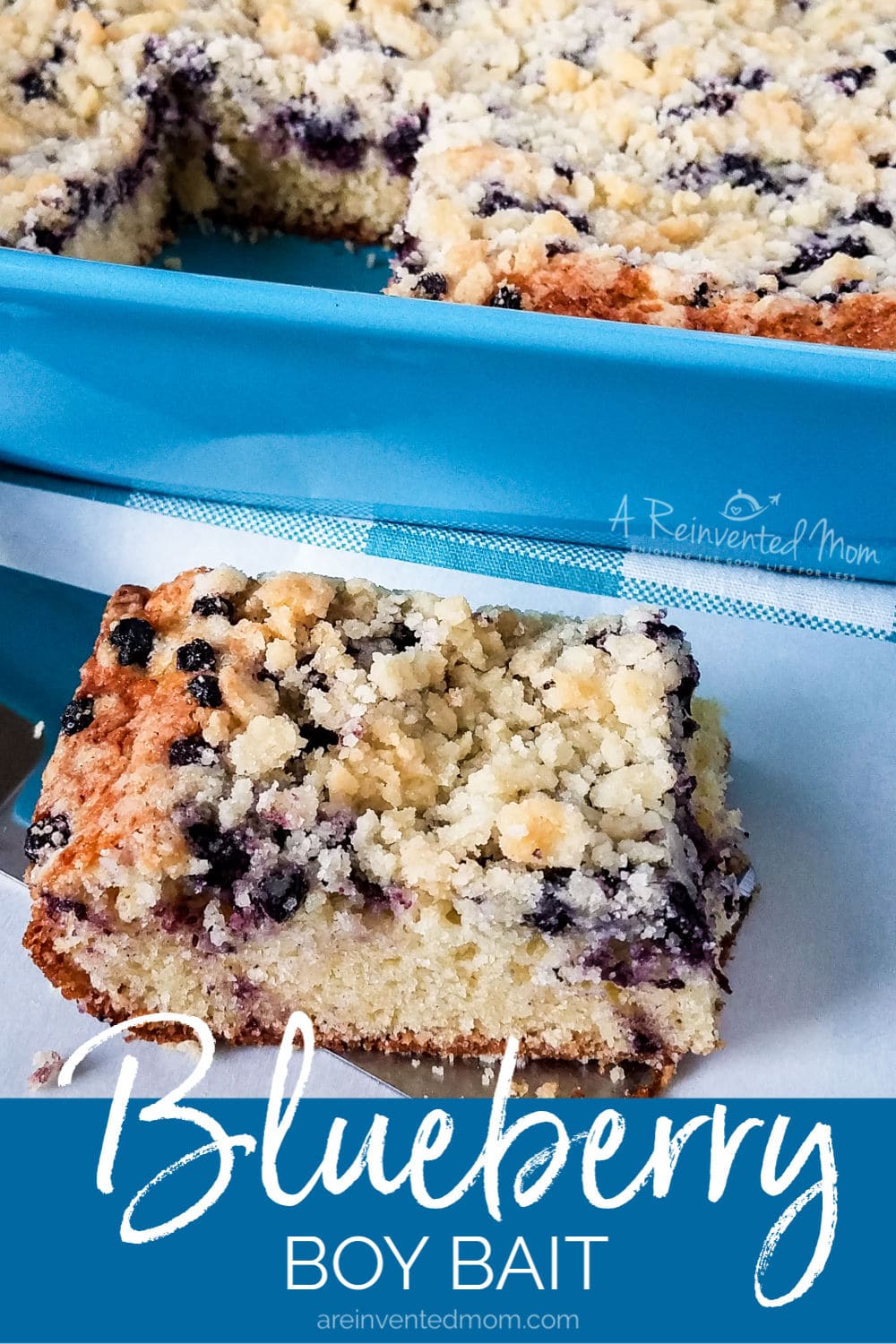 Slice of Blueberry Boy Bait on spatula with cake pan in the background.