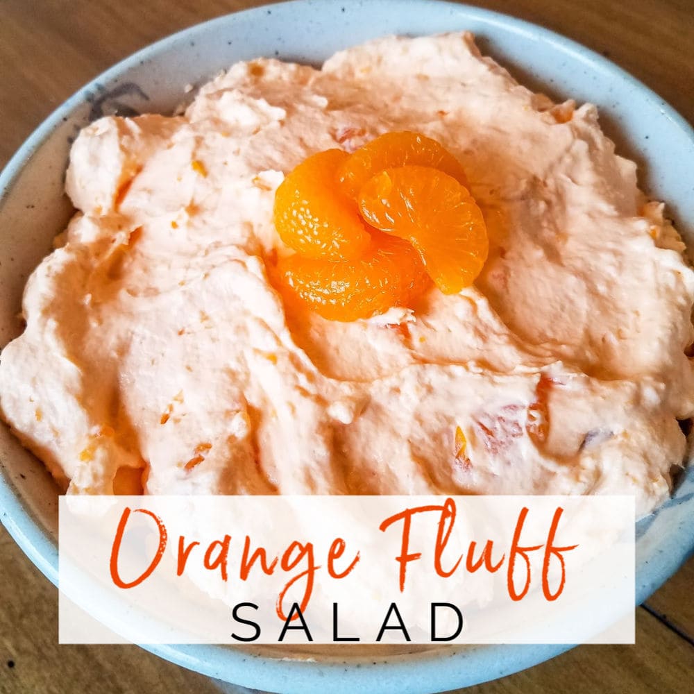 Closeup of bowl of orange fluff salad | A Reinvented Mom #orangejellosalad