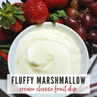 Marshmallow Fruit Dip in a white bowl with strawberries & grapes | A Reinvented Mom