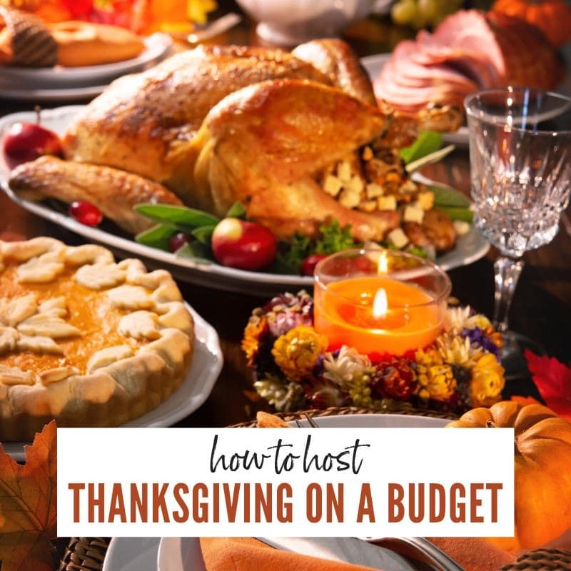 Cooked turkey, pumpkin pie, empty wine glass & Thanksgiving decorations | Hosting Thanksgiving on a Budget | A Reinvented Mom