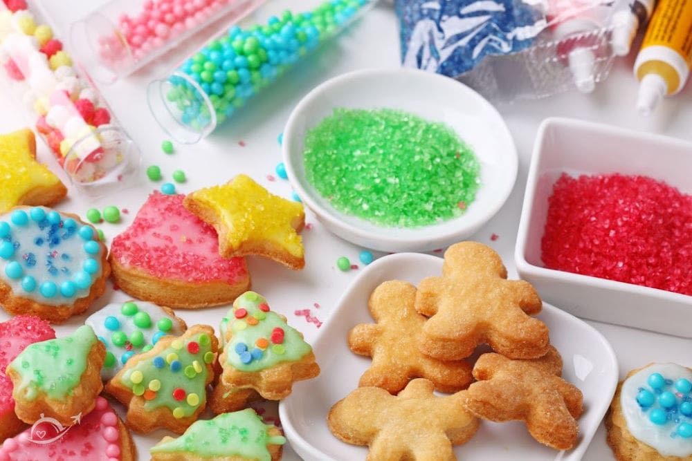 Christmas cutout cookies with an assortment of frostings & decorations.