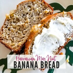 Two slices of Hawaiian Banana Bread, one with butter, on a plate | A Reinvented Mom