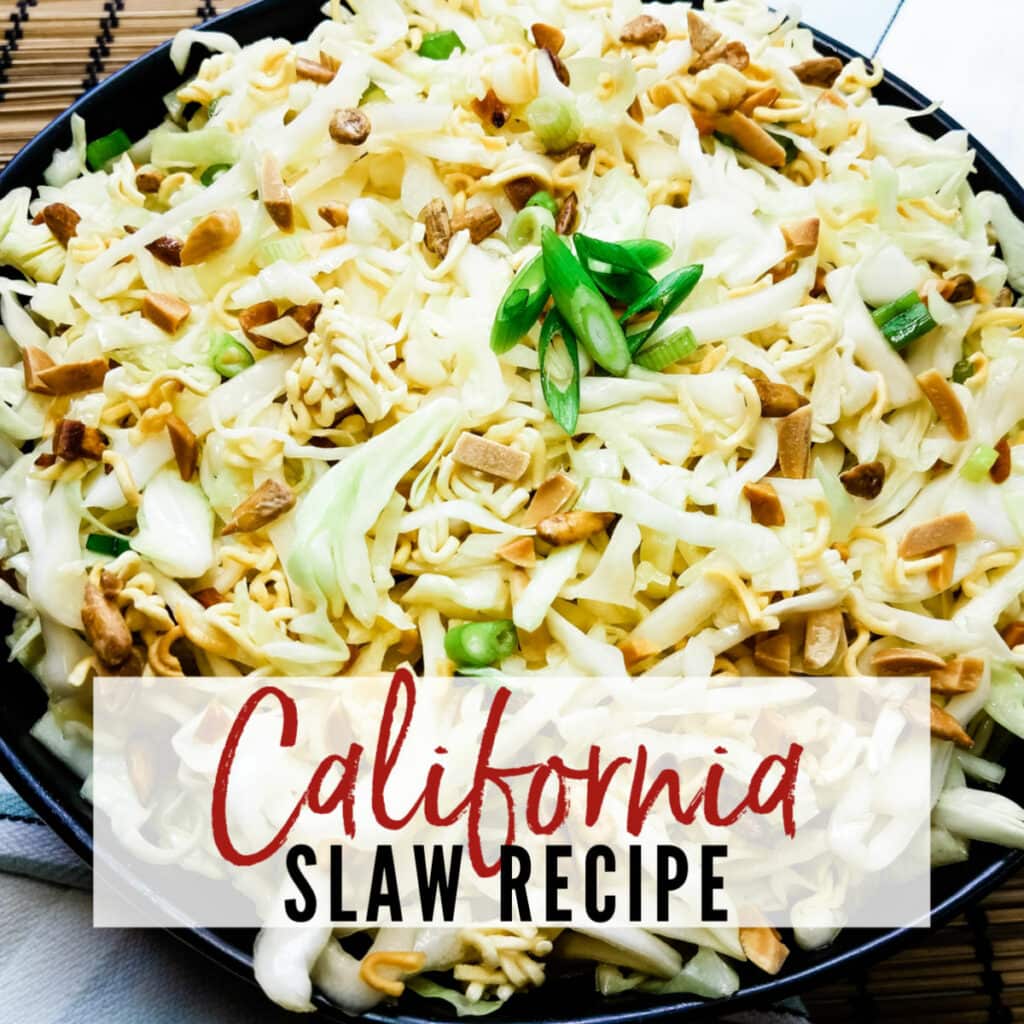 Close up view of bowl of California Slaw Recipe with cabbage, ramen noodles, almonds & green onions | A Reinvented Mom