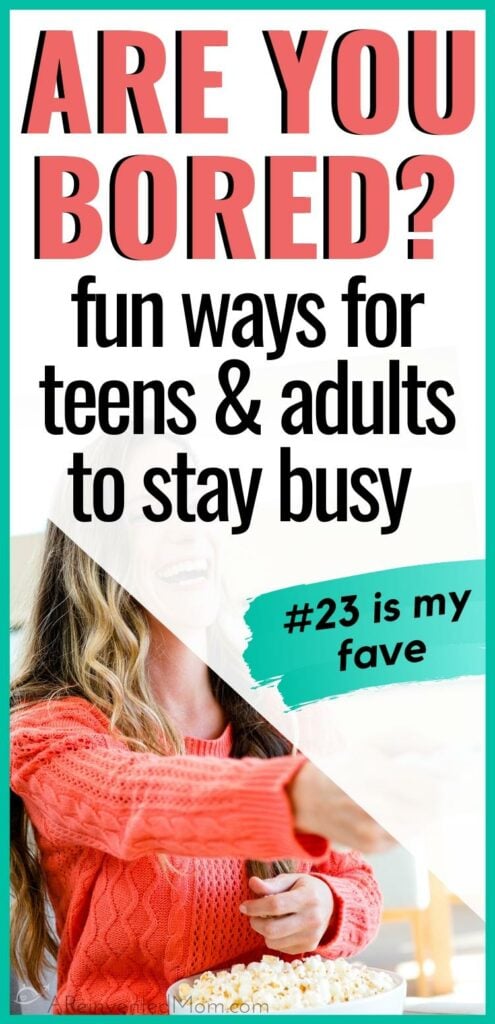 Woman wearing an orange sweater & holding a bowl of popcorn with Bored at Home? Fun Ways to Stay Busy Graphic | A Reinvented Mom