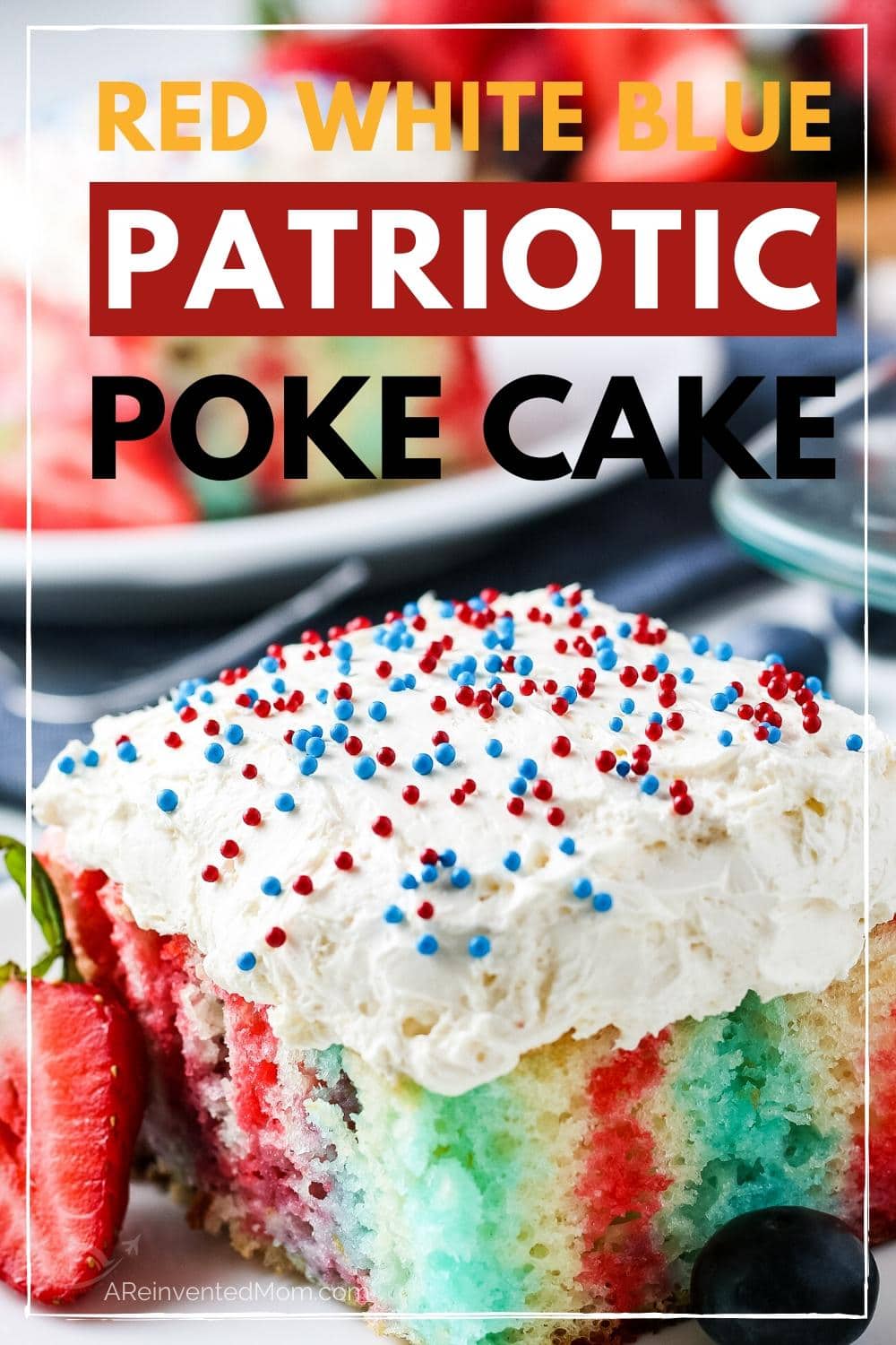 Closeup of slice of poke cake with frosting and sprinkles | A Reinvented Mom