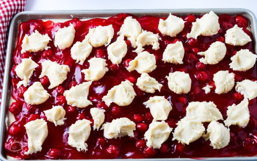 Pan of unbaked Cherry Pie Bars | A Reinvented Mom