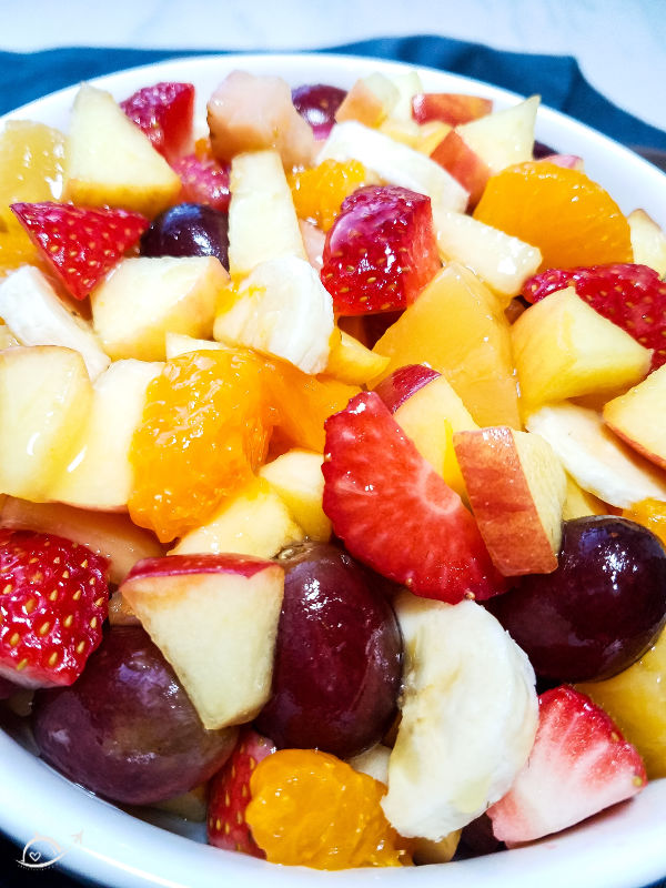 close up shot of fruit cocktail salad before mixing in pudding