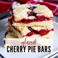 Three dessert bars on a white plate with Glazed Cherry Pie Bars graphic | A Reinvented Mom