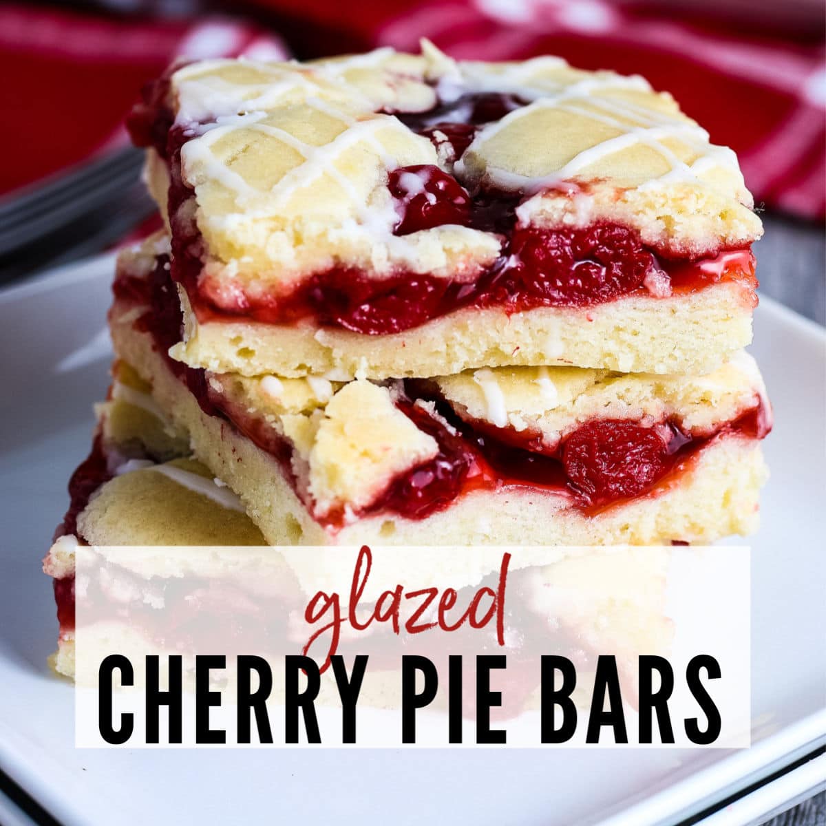 Three dessert bars on a white plate with Glazed Cherry Pie Bars graphic | A Reinvented Mom