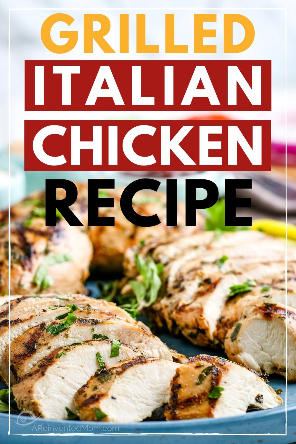 Close up of italian grilled chicken breasts topped with a garnish with a text overlay