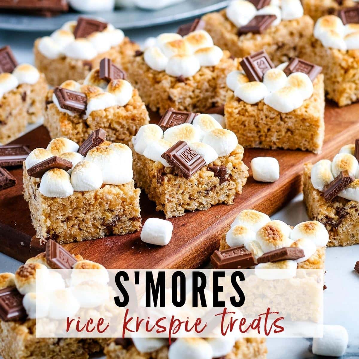 Cut S'mores Rice Krispie Treats on a wooden serving board with graphic overlay.