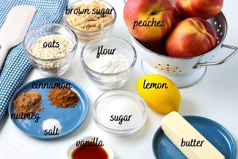 ingredients for peach crumble labeled next to spatula and blue dish towel