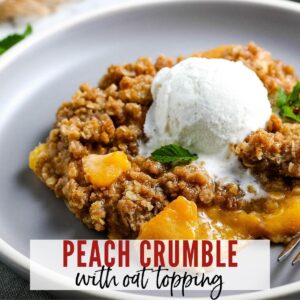 close up of peach crumble with oats topped with vanilla ice cream with text overlay