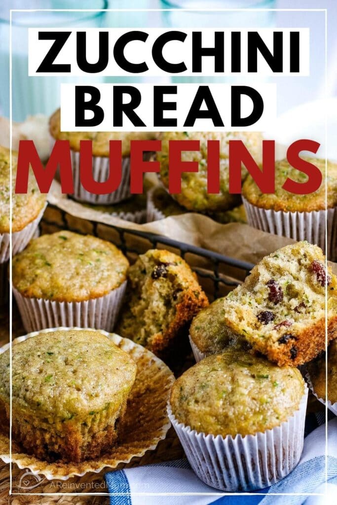 zucchini bread muffins in muffin liners after baking with text overlay