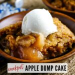 front view of crockpot apple dump cake in a bowl with a scoop of vanilla ice cream