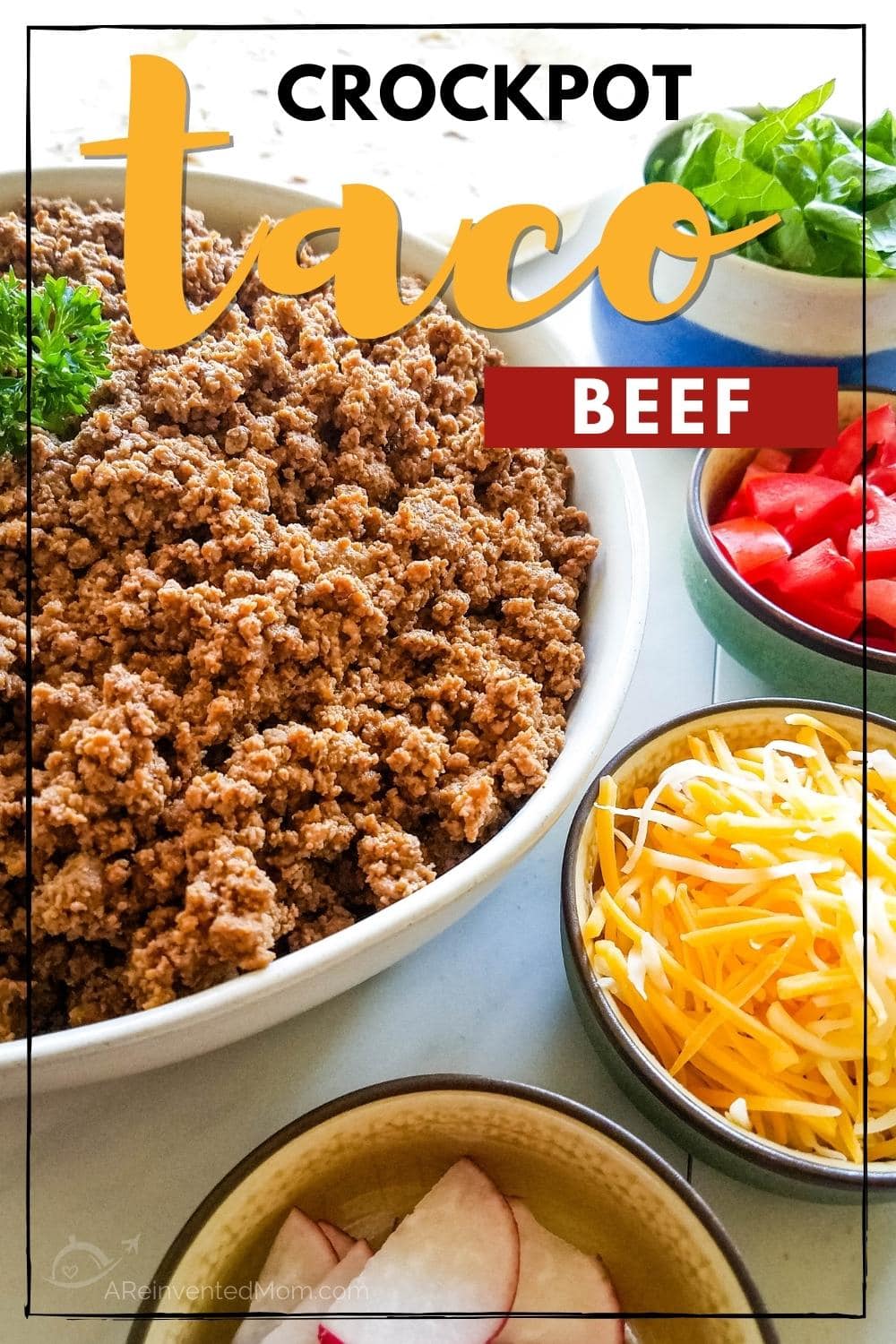 Large white bowl filled with cooked minced beef, smaller bowls filled with radishes, cheese, tomato & lettuce with Crockpot Taco Meat graphic overlay.