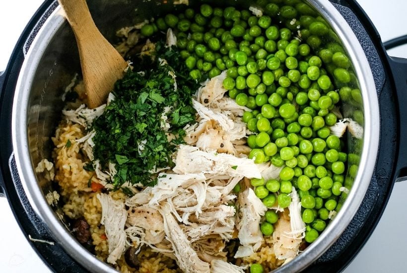 all ingredients for Instant pot chicken and rice inside the instant pot