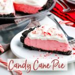 Slice of no bake candy cane pie garnished with crushed peppermint candies and whipped cream with text overlay.