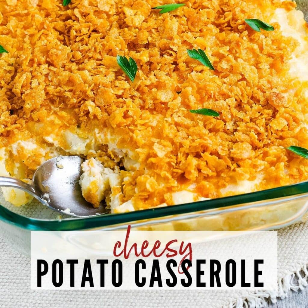 cheesy potatoes with cornflake topping in a glass baking dish with graphic overlay