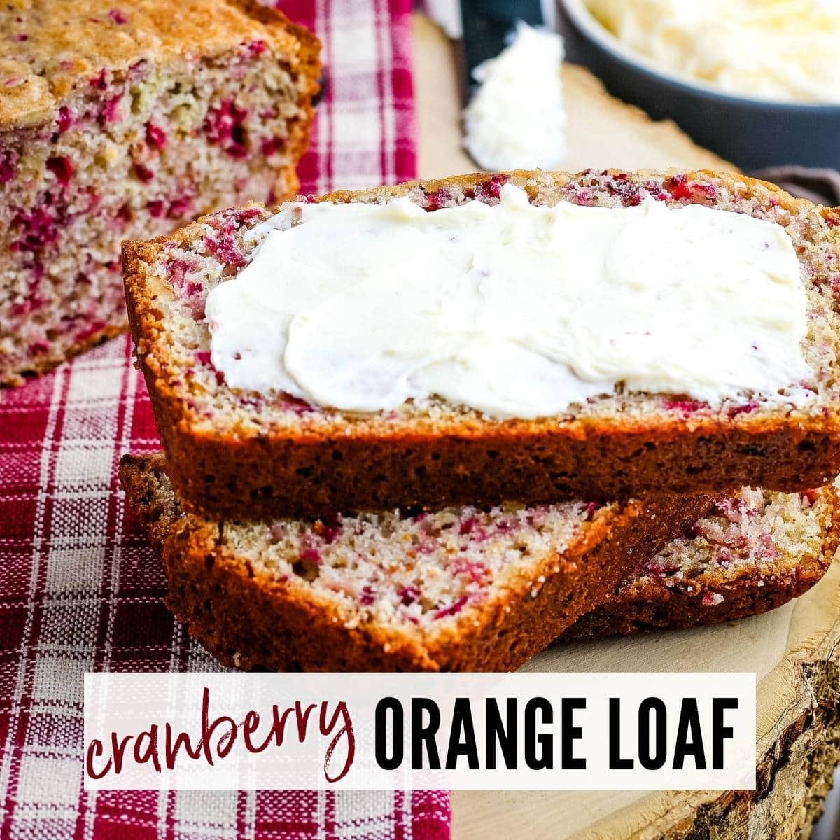 3 stacked slices of cranberry orange bread with icing.