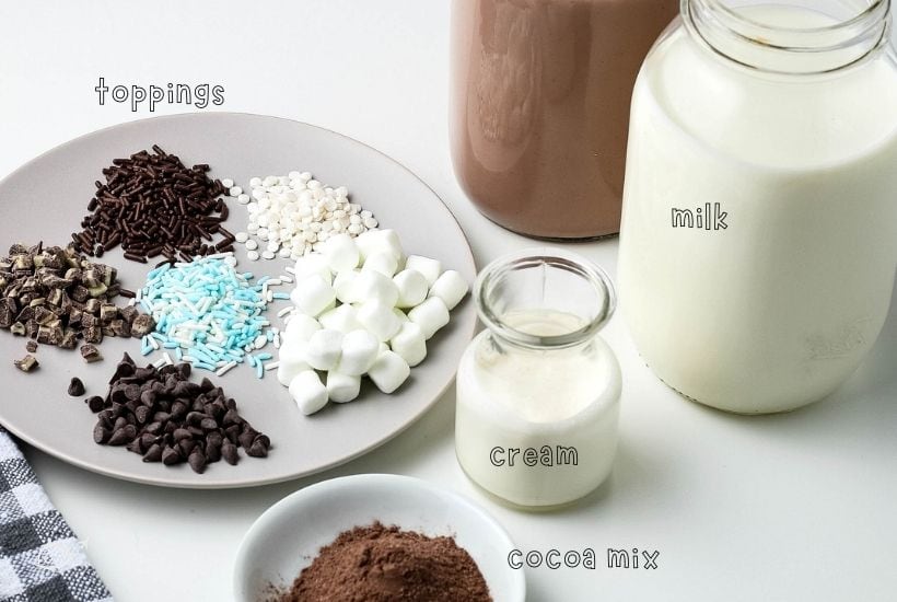 whipped hot chocolate ingredients on a white counter