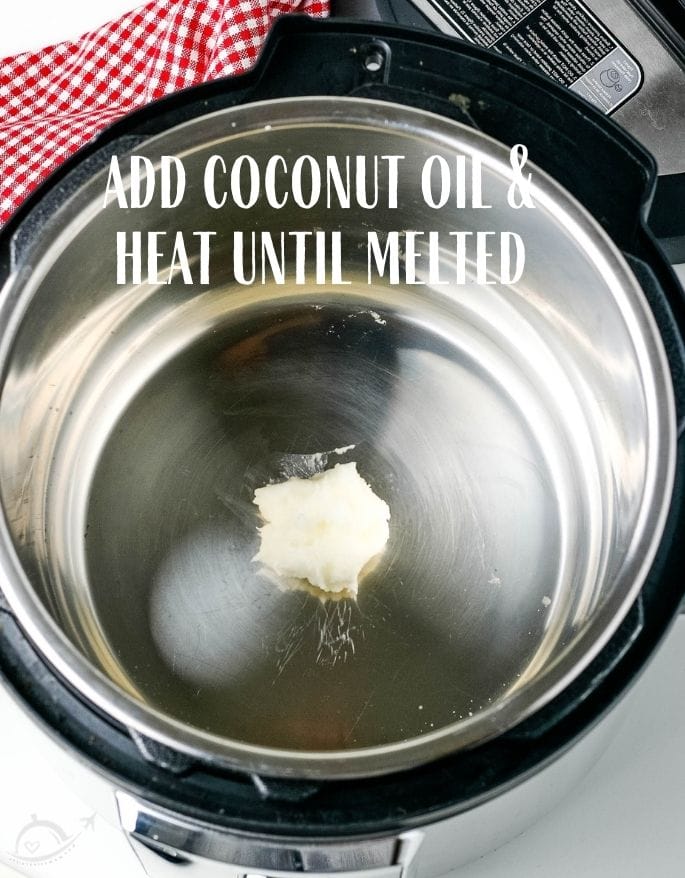 Coconut oil in instant pot text overlay add coconut oil and heat until melted