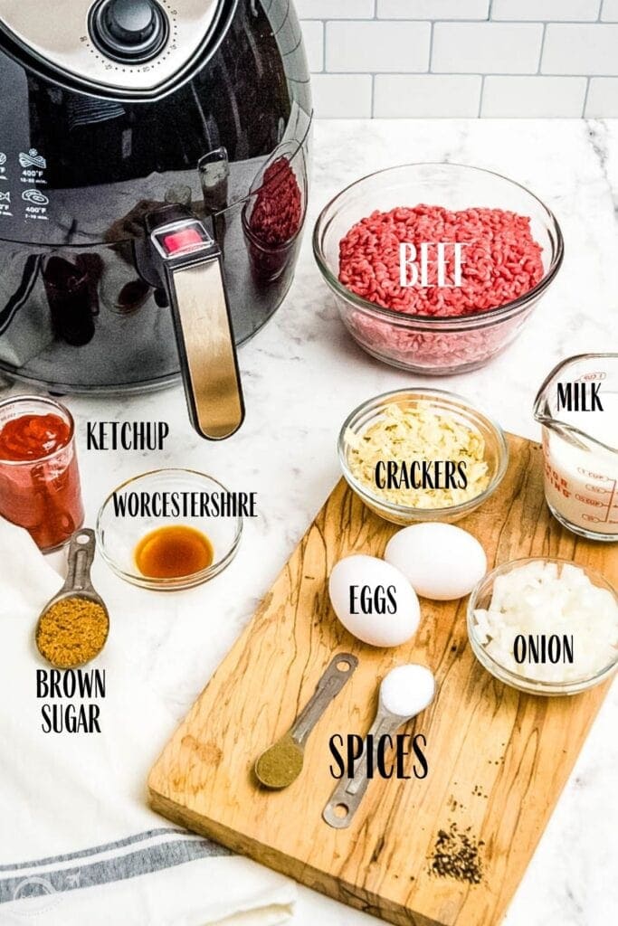 Ingredients to make meatloaf with text labels next to an air fryer.