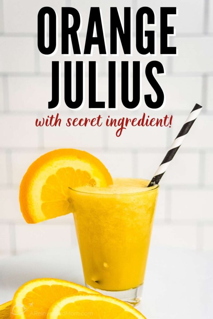 glass of orange Julius drink with orange slices on a white background with text overlay