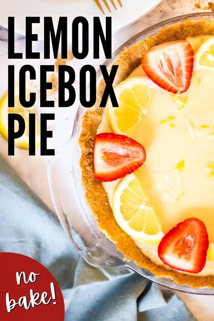 top view of lemon icebox pie after chilling with lemon wedges and strawberry halves for garnish with text overlay