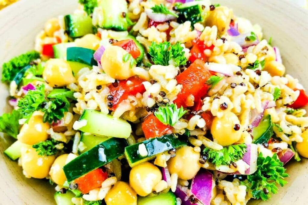 close up of quinoa chickpea salad in a small bowl