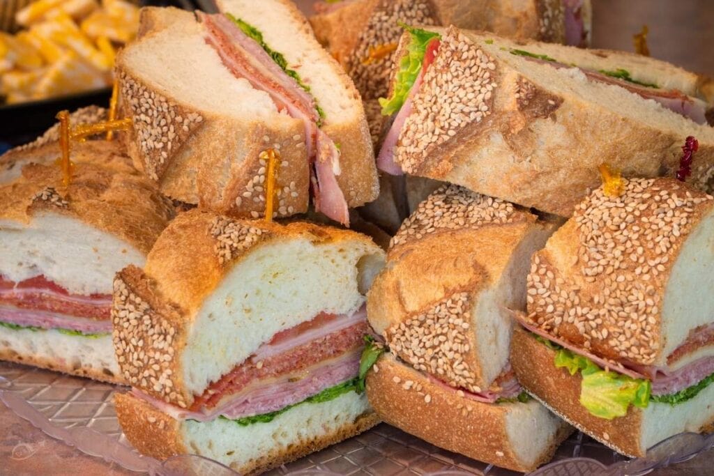 small sub sandwiches on a clear plate