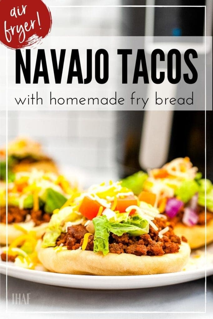 three indian fry bread tacos on a white plate with text overlay