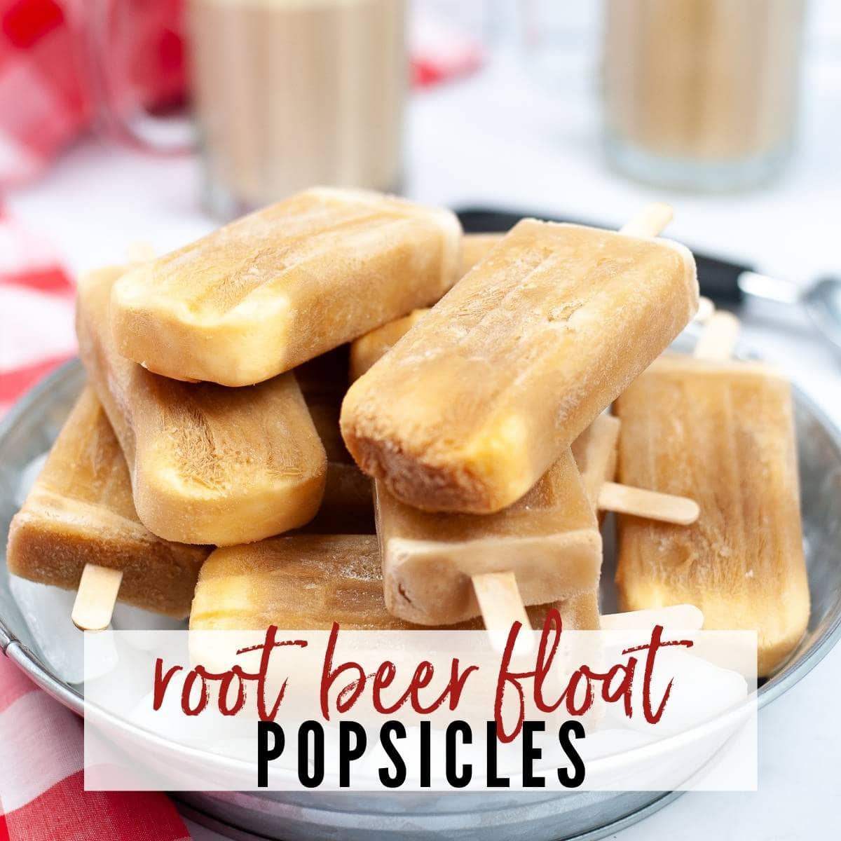 a metal bowl filled with root bear float popsicles and a graphic overlay