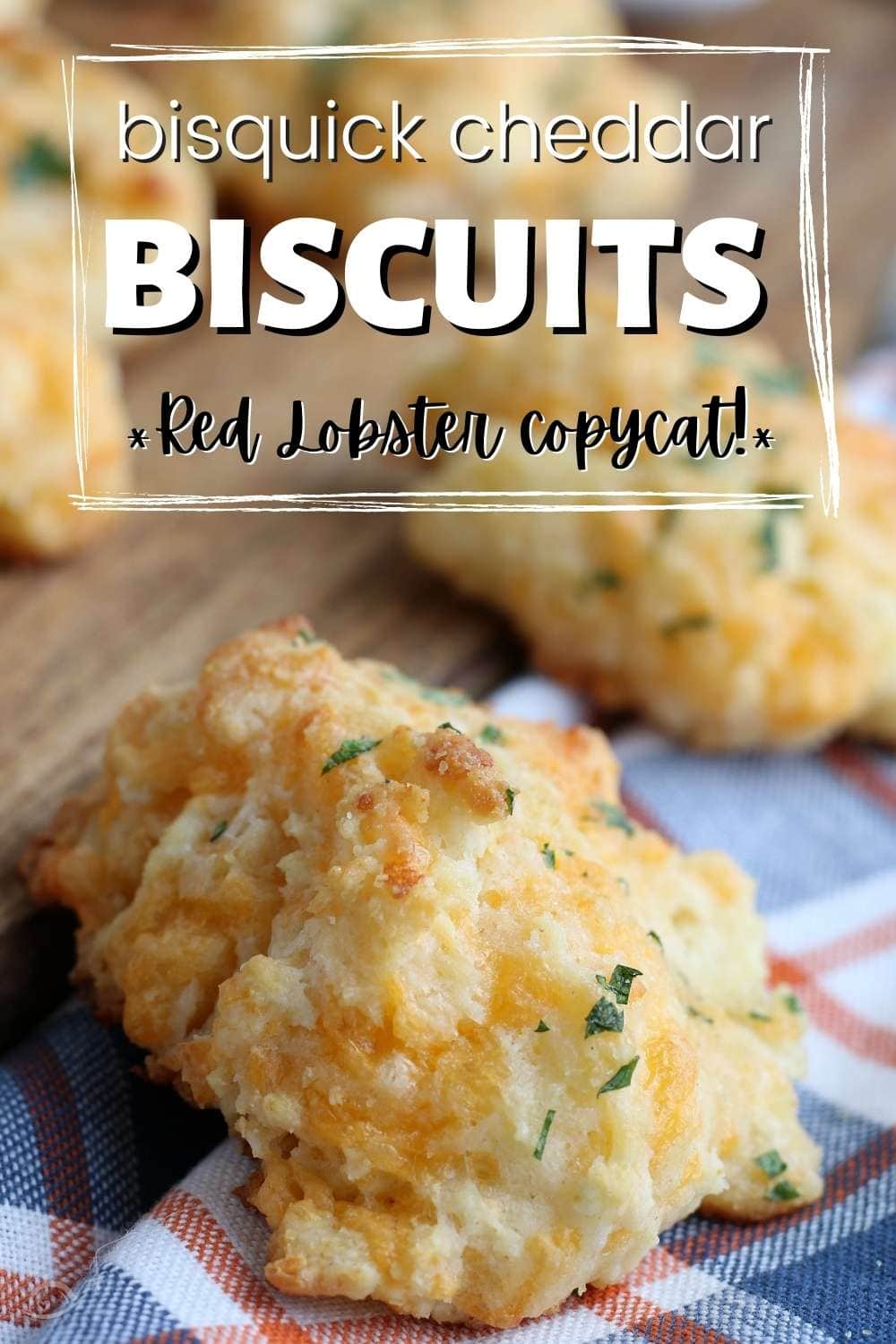 Closeup view of cheddar biscuits made with Bisquick with text overlay.