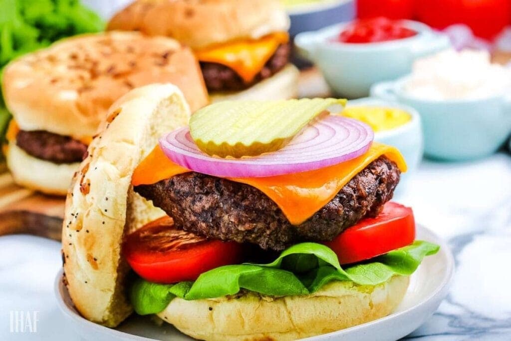 air fryer hamburger patty on a bun with toppings