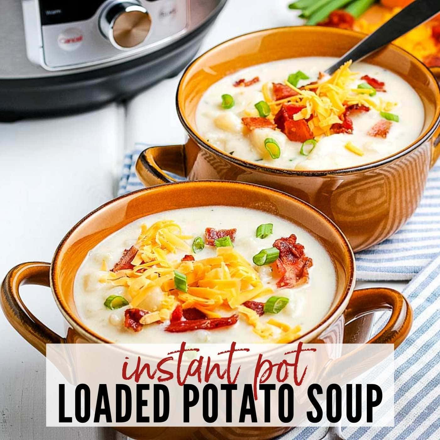 two bowls of loaded potato soup garnished with bacon, cheese and green onions with instant pot in the background.