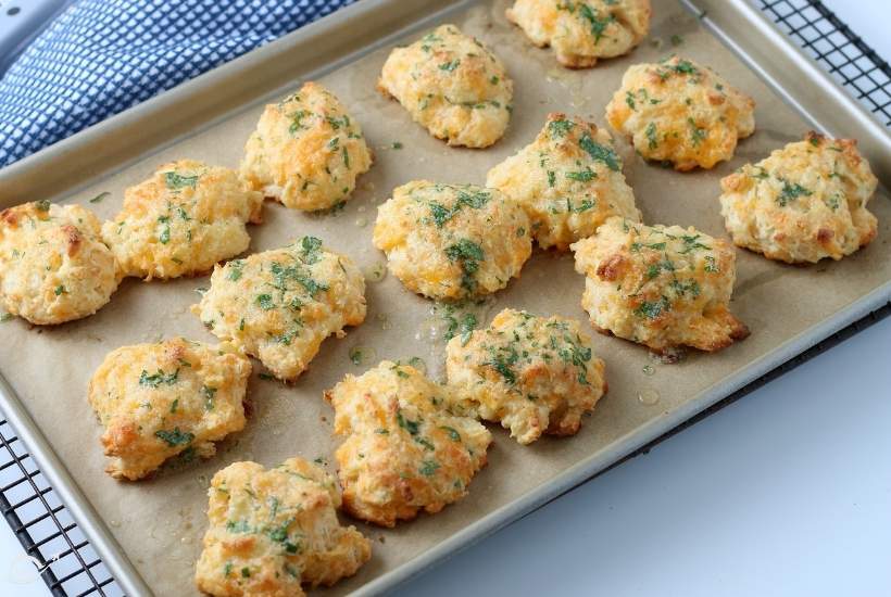 A pan full of baked Red Lobster Cheddar Bay biscuits made from Bisquick.