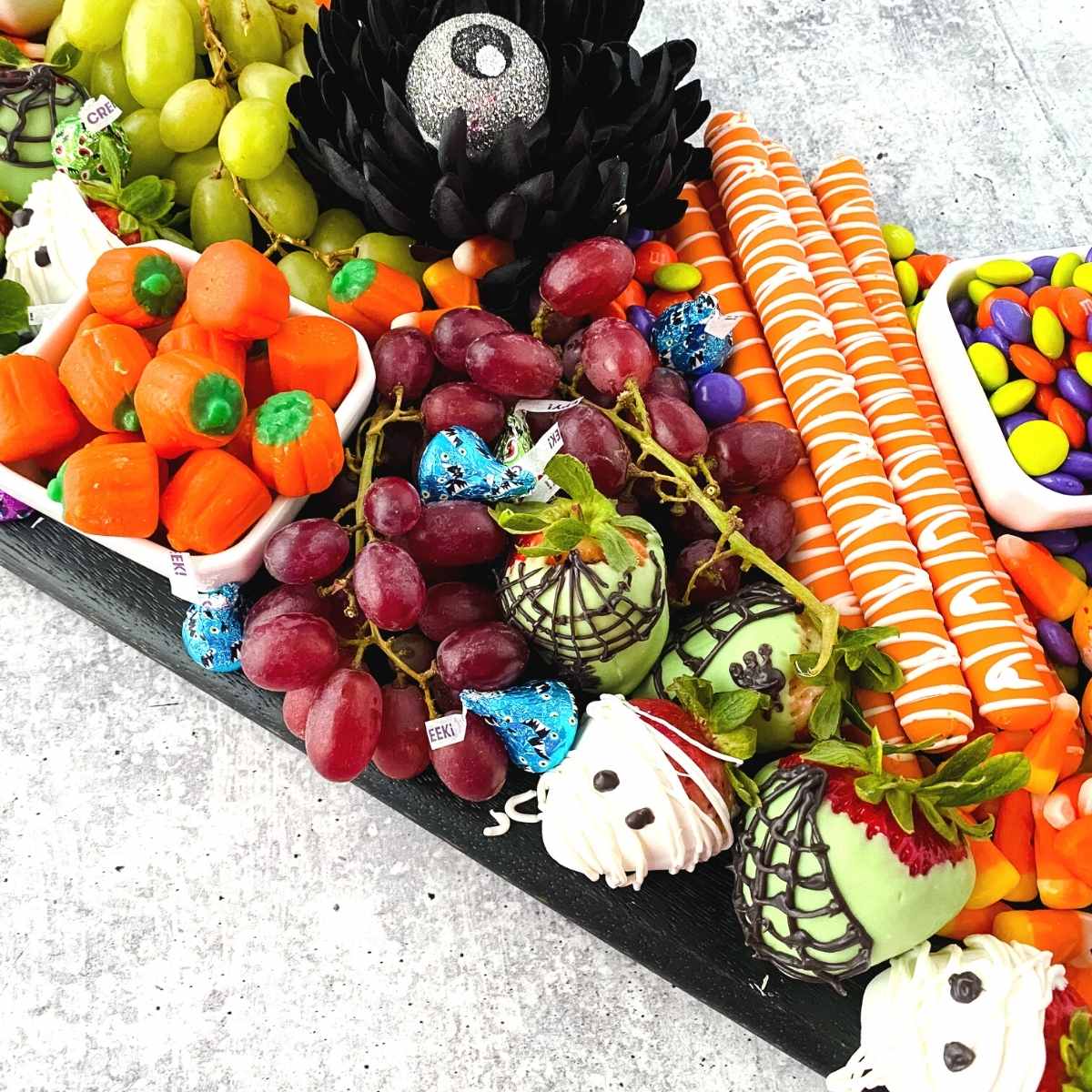 close up of a halloween charcuterie dessert board