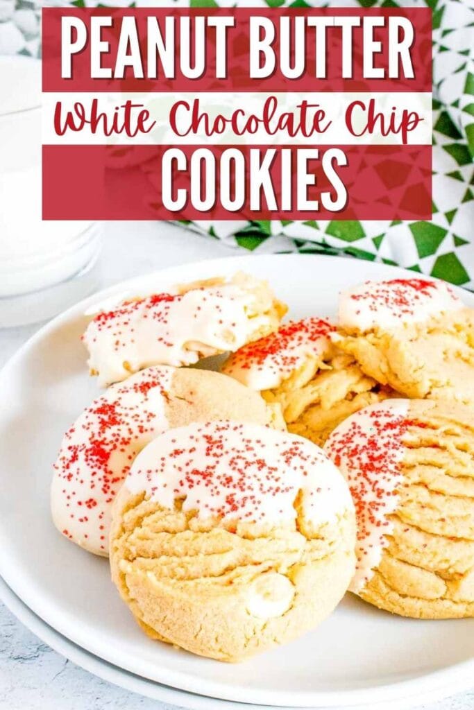 A plate filled with White Chocolate Peanut Butter Cookies next to a glass of milk with text overlay.