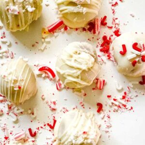 close up of peppermint cake balls with peppermint crumbs