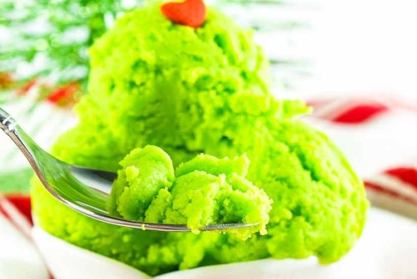 neon green edible sugar cookie dough on a spoon