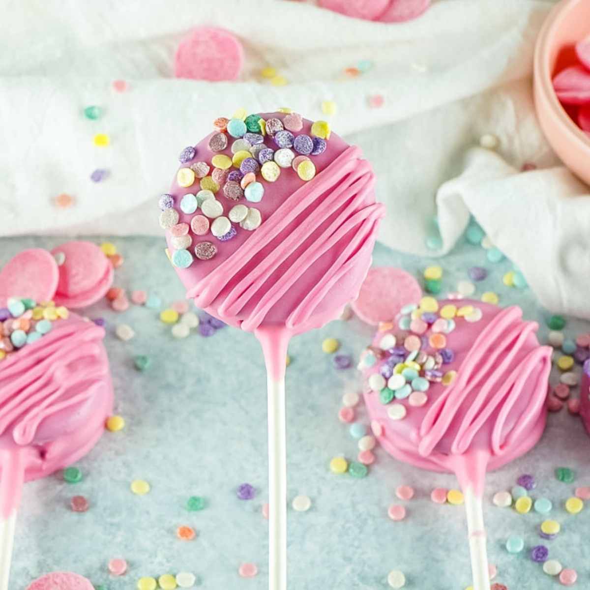 closeup of valentines day oreo pops dipped in pink chocolate