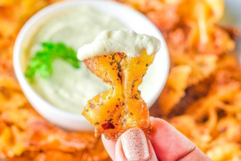 pasta chip that has been dipped into whipped feta dip