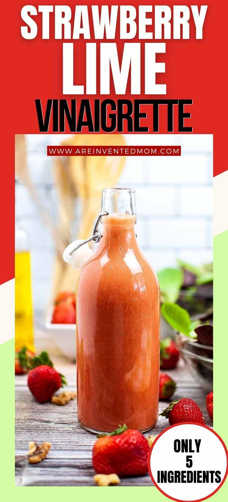 Tall glass bottle filled with homemade strawberry dressing with lime surrounded by fresh berries with text overlay.